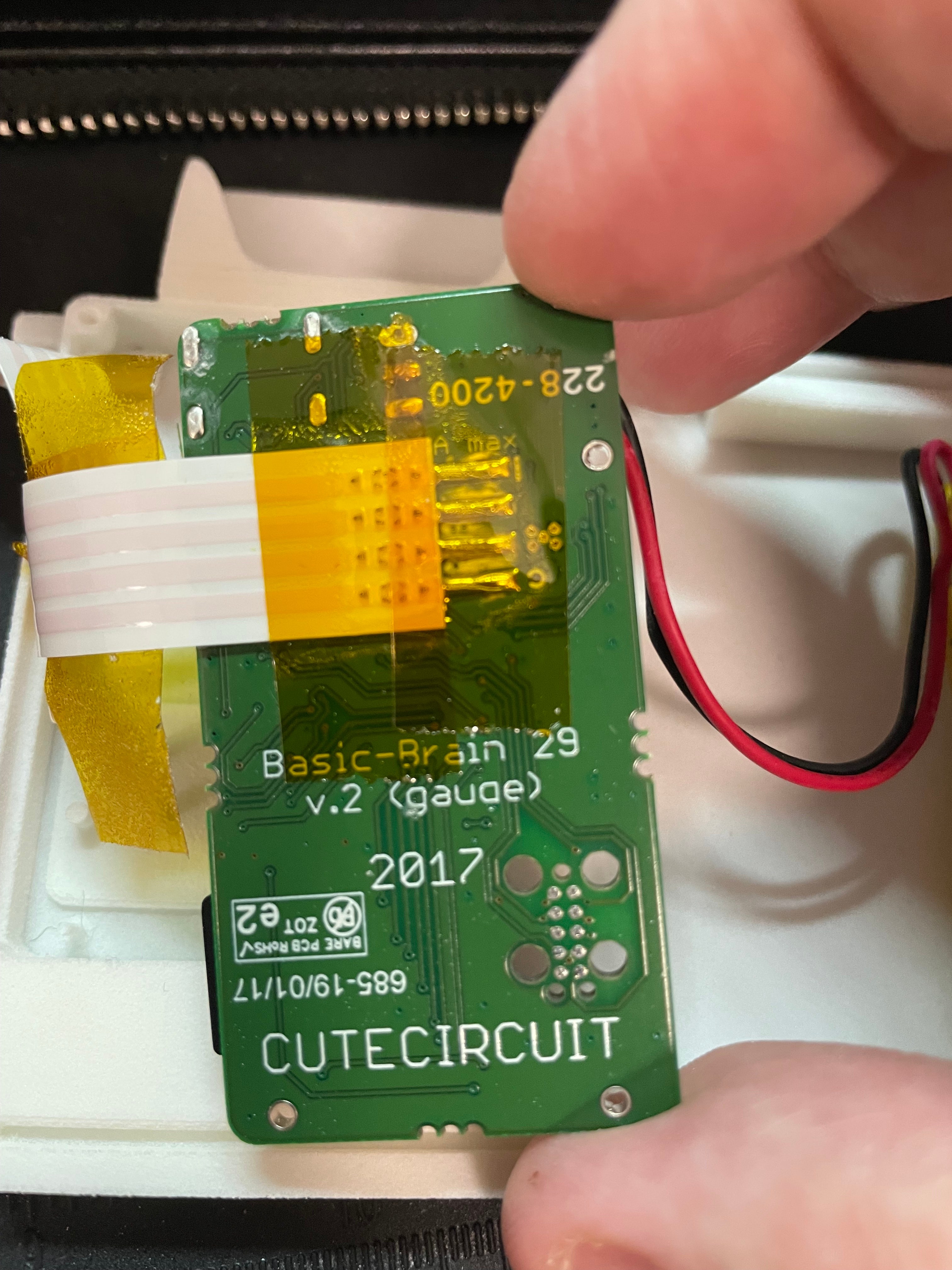 Back of the controller board, showing "Basic-Brain 29 v.2 (gauge) 2017" label and CUTECIRCUIT branding